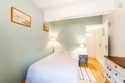 Un ou plusieurs lits dans un hébergement de l'établissement Le charme au cœur du Vieux Lyon AIL
