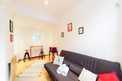 Coin salon dans l'établissement Le charme au cœur du Vieux Lyon AIL