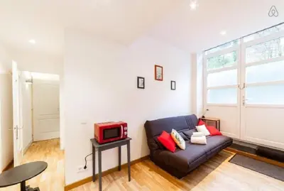 Coin salon dans l'établissement Le charme au cœur du Vieux Lyon AIL