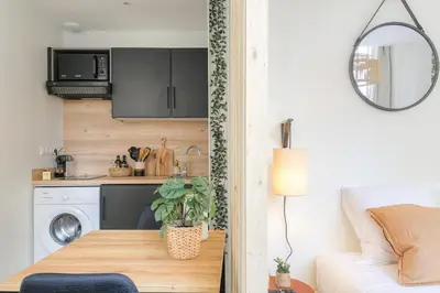 Cuisine ou kitchenette dans l'établissement Le cosy en hypercentre