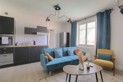 Cuisine ou kitchenette dans l'établissement Design et Convivial avec parking gratuit