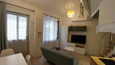 Télévision ou salle de divertissement dans l'établissement Studio cosy Lyon quai de Saône, centre ville