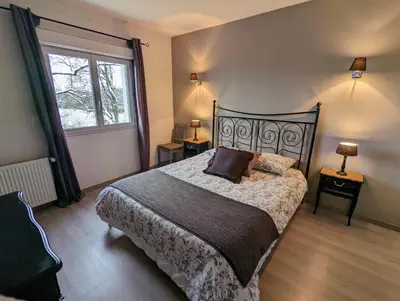 Un ou plusieurs lits dans un hébergement de l'établissement La Maison de Boyeux