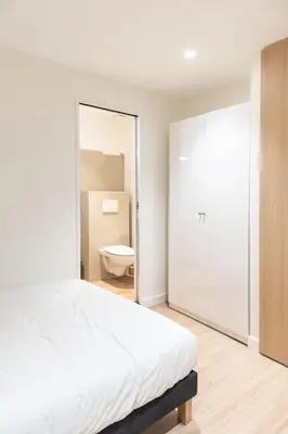 Un ou plusieurs lits dans un hébergement de l'établissement Croix Paquet - Appartements à Lyon