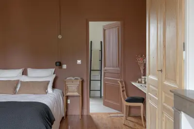 Un ou plusieurs lits dans un hébergement de l'établissement La Maison des Monts d'Or