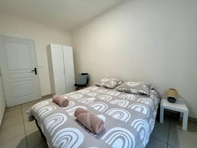 Un ou plusieurs lits dans un hébergement de l'établissement Bel appartement à 15 min de Lyon