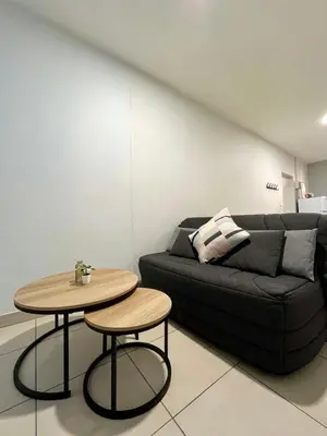 Coin salon dans l'établissement Bel appartement à 15 min de Lyon