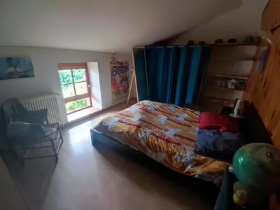 Un ou plusieurs lits dans un hébergement de l'établissement Maison de campagne vue panoramique