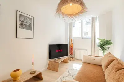 Télévision ou salle de divertissement dans l'établissement Charmant et cosy en hypercentre