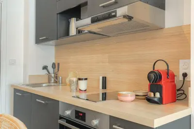 Cuisine ou kitchenette dans l'établissement Charmant et cosy en hypercentre