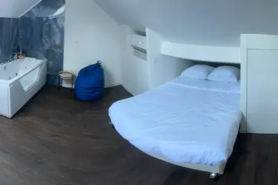 Un ou plusieurs lits dans un hébergement de l'établissement Villa Jacqueline