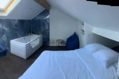 Un ou plusieurs lits dans un hébergement de l'établissement Villa Jacqueline