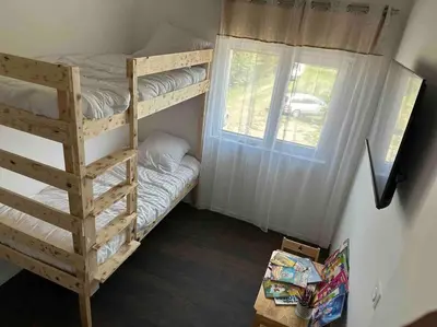 Un ou plusieurs lits dans un hébergement de l'établissement Villa Jacqueline