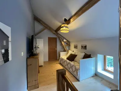 Un ou plusieurs lits dans un hébergement de l'établissement La maison des commis