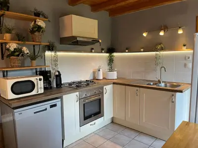 Cuisine ou kitchenette dans l'établissement La maison des commis