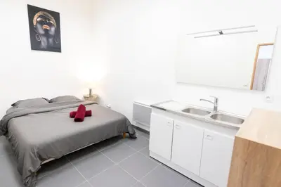 Un ou plusieurs lits dans un hébergement de l'établissement LOFT LA MINE D'OR - Parking gratuit et privé - Wifi - Tout équipé - Machine à laver
