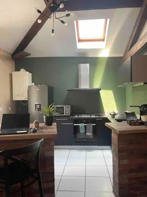 Cuisine ou kitchenette dans l'établissement Appartement de charme 80m2