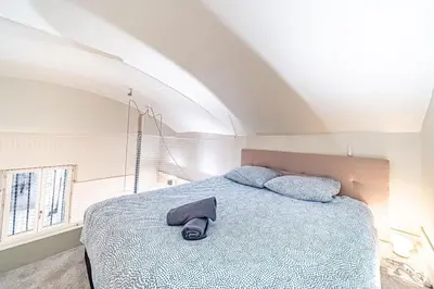 Un ou plusieurs lits dans un hébergement de l'établissement Le petit chazette -Appartement calme dans les pentes de la croix rousse