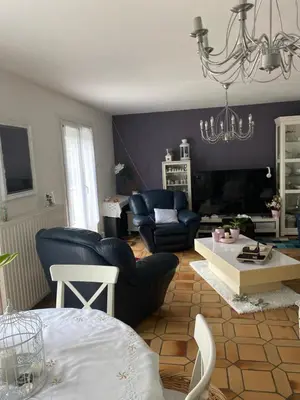 Coin salon dans l'établissement Chambres Quiétude