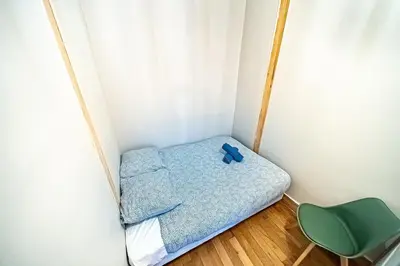 Un ou plusieurs lits dans un hébergement de l'établissement Le Ilda - Charming appartment near perrache