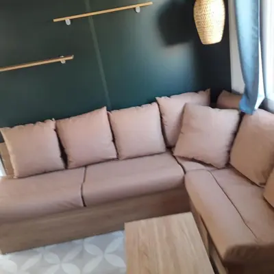 Coin salon dans l'établissement Mobile-home dans camping 4 étoiles