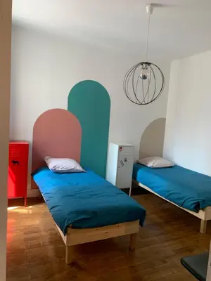 Un ou plusieurs lits dans un hébergement de l'établissement Appartement T3 Lyon, part Dieu