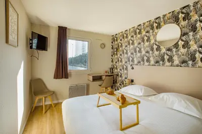 Un ou plusieurs lits dans un hébergement de l'établissement Gabhouse - Lyon Gerland - City Living Stay