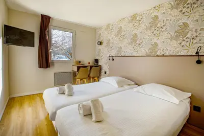 Un ou plusieurs lits dans un hébergement de l'établissement Gabhouse - Lyon Gerland - City Living Stay