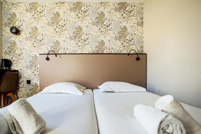 Un ou plusieurs lits dans un hébergement de l'établissement Gabhouse - Lyon Gerland - City Living Stay