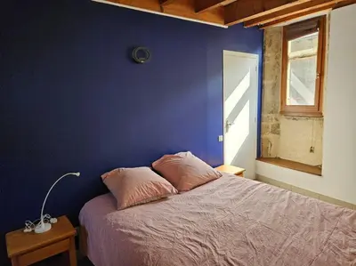 Un ou plusieurs lits dans un hébergement de l'établissement Appartement Malleval Chez Jeanne