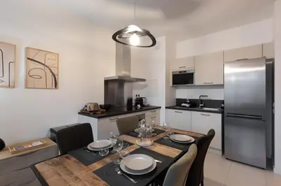 Cuisine ou kitchenette dans l'établissement Le Conflu Home - En plein cœur de la Confluence