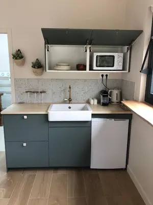Cuisine ou kitchenette dans l'établissement La parenthèse