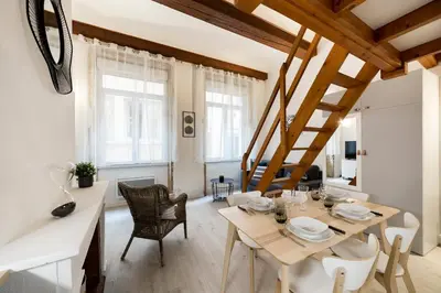 Coin salon dans l'établissement All in Lyon | Appartement cosy avec mezzanine Lyon centre