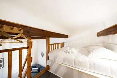 Un ou plusieurs lits dans un hébergement de l'établissement All in Lyon | Appartement cosy avec mezzanine Lyon centre