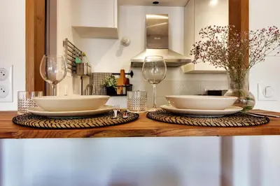 Cuisine ou kitchenette dans l'établissement Appartement cosy, confortable et idéalement situé