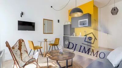 Télévision ou salle de divertissement dans l'établissement Appartements Lyon 3