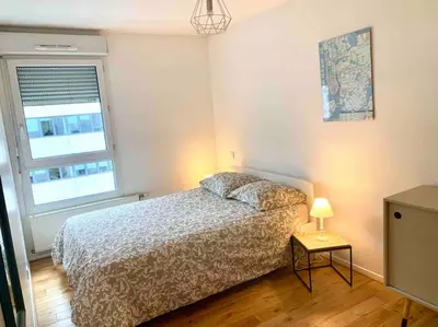 Un ou plusieurs lits dans un hébergement de l'établissement Appartement cosy