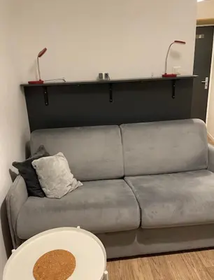 Coin salon dans l'établissement Cosy Studio 16m2