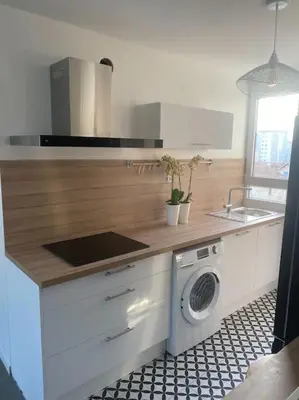 Cuisine ou kitchenette dans l'établissement T3 Lyon 8 parc parilly-Eurexpo -9min en voiture-garage privé