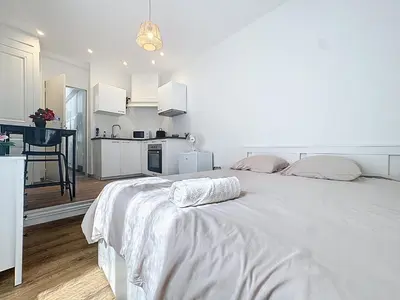 Un ou plusieurs lits dans un hébergement de l'établissement Appartement Cosy Saint-Chamond