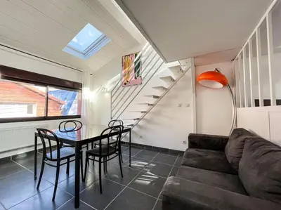 Coin salon dans l'établissement Spring Palm - Appartement 4 personnes - Check in h24 & Wifi