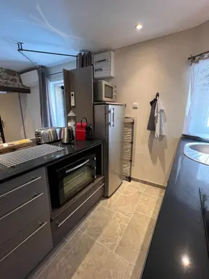 Cuisine ou kitchenette dans l'établissement Le petit nid du Vivier