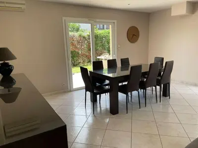 Coin salon dans l'établissement Villa individuelle - CHASSIEU