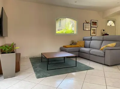 Coin salon dans l'établissement Villa individuelle - CHASSIEU
