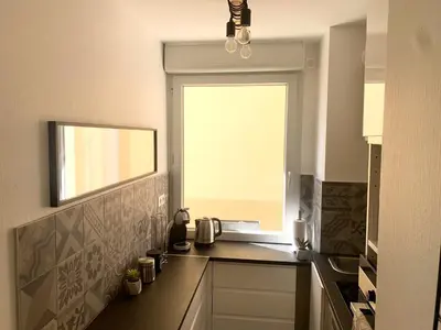 Coin salon dans l'établissement Appartement Les Hauts du Beaujolais