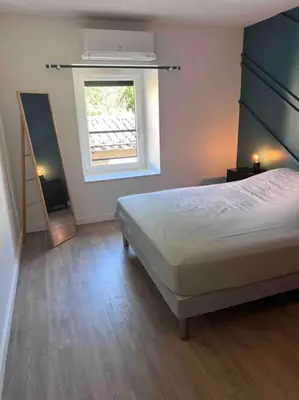Un ou plusieurs lits dans un hébergement de l'établissement Gîte Anna