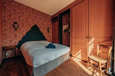 Un ou plusieurs lits dans un hébergement de l'établissement Superbe appartement lyonnais, vue sur Saône