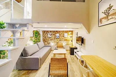 Coin salon dans l'établissement Le loft Montesquieu spacieux 6 pers Saxe Gambetta