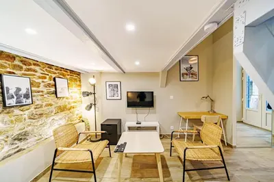 Télévision ou salle de divertissement dans l'établissement Le loft Montesquieu spacieux 6 pers Saxe Gambetta