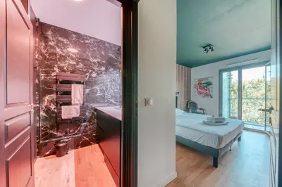 Un ou plusieurs lits dans un hébergement de l'établissement GuestReady - Apt près du Parc de la Tête d'Or
